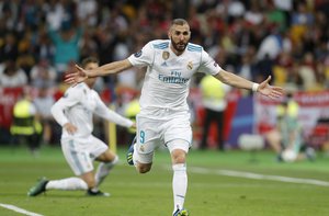 Real Madrid's Karim Benzema reacts after being offside during the Champions League Final soccer match between Real Madrid and Liverpool at the Olimpiyskiy Stadium in Kiev, Ukraine, Saturday, May 26, 2018.