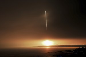 In this photo released by Xinhua News Agency, a Long March 7 rocket carrying the Tianzhou 1 cargo spacecraft blasts off from the Wenchang Space Launch Center in Wenchang in southern China's Hainan Province