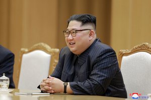 In this Wednesday, May 9, 2018, photo provided on Thursday, May 10, 2018, by the North Korean government, North Korean leader Kim Jong Un attends a meeting with U.S. Secretary of State Mike Pompeo at the Workers' Party of Korea headquarters in Pyongyang, North Korea.