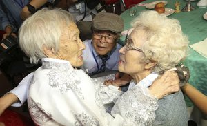 South Korean Cho Hye-do, 86, right, meets her North Korean sister Cho Sun Do, 89, left, during the Separated Family Reunion Meeting at the Diamond Mountain resort in North Korea, Monday, Aug. 20, 2018.