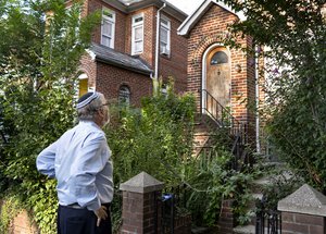 New York State Assemblyman, Dov Hikind, D-Brooklyn, pauses after speaking to reporters in front of the former residence of Nazi war crimes suspect Jakiw Palij Tuesday, Aug. 21, 2018, in the Queens borough of New York.