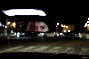 Hessah al-Ajaji drivers her car down the capital's busy Tahlia Street after midnight for the first time in Riyadh, Saudi Arabia, Sunday, June 24, 2018.