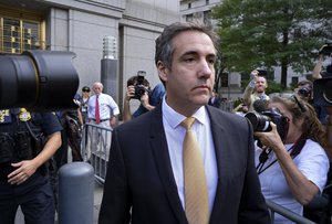 Michael Cohen, former personal lawyer to President Donald Trump, leaves federal court after reaching a plea agreement in New York, Tuesday, Aug. 21, 2018.