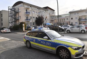 Police officers stand in front of a senior home in Ahlen, Germany, where Jakiw Palij, a former Nazi concentration camp guard, arrived earlier Tuesday, Aug. 21, 2018.