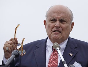 In this Aug. 1, 2018 file photo, Rudy Giuliani, an attorney for President Trump, speaks during campaign event for Eddie Edwards, who is running for the U.S. Congress in New Hampshire, in Portsmouth, N.H.