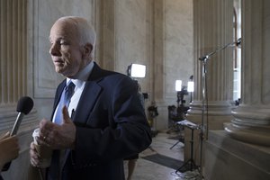 Senate Armed Services Committee Chairman Sen. John McCain, R-Ariz., responds to questions on Capitol Hill in Washington, Thursday, May 18, 2017, the morning after the Justice Department appointed former FBI Director Robert Mueller to lead an investigation into President Donald Trump's firing of FBI Director James Comey.