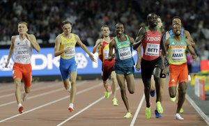 Kenya's Kipyegon Bett, second right, runs to the line to win a Men's 800m semifinal during the World Athletics Championships in London Sunday, Aug. 6, 2017