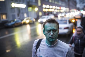 Alexei Navalny, Russian opposition leader, is pictured on a street after zelenka attack in Moscow