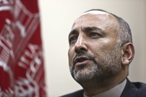 In this Saturday, Oct. 24, 2015, photo, Afghan National Security Adviser Mohammad Hanif Atmar speaks during an interview with The Associated Press, in Kabul, Afghanistan.