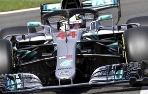 Mercedes driver Lewis Hamilton of Britain steers his car during a qualifying session