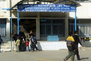 File - Palestinian children are seen at a United Nations school in Rafah, Southern Gaza.