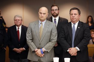 Roy Oliver, fired Balch Springs police officer, standing next to his defense attorney Miles Brissette (far right), reacts after receiving a sentence of 15 years in prison for the murder of 15-year-old Jordan Edwards after over five hours of punishment deliberation at the Frank Crowley Courts Building in Dallas on Wednesday, Aug. 29, 2018.