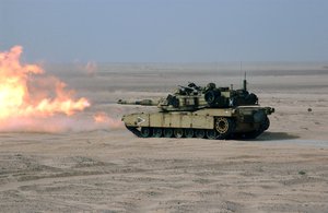 An M1A1 Abrams, firing its US built M256 120-millimeter (4.7 in) tank gun. In 1967 the German Ministry of Defense decided to re-open a Leopard 1 improvement program, known as the Vergoldeter Leopard ("Gilded Leopard"), later renamed the Keiler ("Wild Boar").