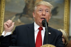 President Donald Trump speaks before signing an executive order on health care in the Roosevelt Room of the White House, Thursday, Oct. 12, 2017, in Washington.