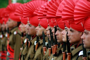 Indian Army Jammu Kashmir Light Infantry Regiments (JKLIR) newly raised soldiers march during a passing out parade on the outskirts of Srinagar, India, Wednesday, April 22, 2009. 414 recruits from Jammu and Kashmir state were formally inducted into JKLIR after training.