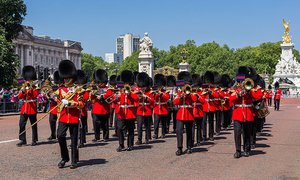 File - The Band of the Welsh Guards as they march south from Buckingham Palace towards Birdcage Walk in London, England.