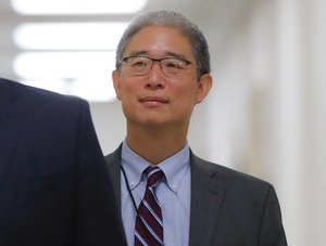 Justice Department official, Bruce G. Ohr, center, arrives for a closed hearing of the House Judiciary and House Oversight committees on Capitol Hill in Washington, Tuesday, Aug. 28, 2018. Ohr will be interviewed as part of an investigation into decisions made by the department in 2016. (AP Photo/Pablo Martinez Monsivais)