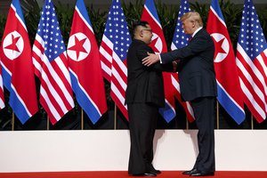 File - In this June 12, 2018, file photo, President Donald Trump meets with North Korean leader Kim Jong Un on Sentosa Island, in Singapore.