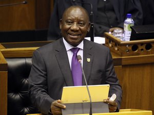 In this Friday, Feb. 16, 2018 file photo, South Africa's new President, Cyril Ramaphosa, delivers his State of the Nation address in parliament in Cape Town, South Africa.