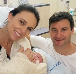 In this photo released by the Office of the Prime Minister of New Zealand, Prime Minster Jacinda Ardern and her partner Clarke Gayford pose with their newborn daughter at the Auckland City Hospital, Thursday, June 21, 2018, in Auckland, New Zealand.