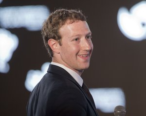 CEO Mark Zuckerberg talks about the Messenger app during the Facebook F8 Developer Conference Wednesday, March 25, 2015, in San Francisco.