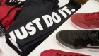 Nike shares were 2.7 per cent lower in mid-afternoon Tuesday trade in New York after having pared still sharper losses ...