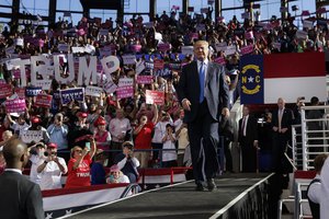 Republican presidential candidate Donald Trump arrives to speak to a campaign rally, Monday, Nov. 7, 2016, in Raleigh, N.C.