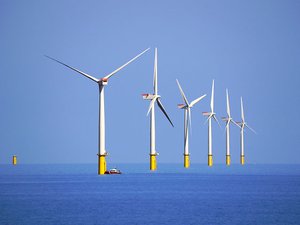 File - Walney Offshore Windfarm. Walney Wind Farm is an offshore wind farm 14 km west of Walney Island off the coast of Cumbria, in the Irish Sea, England.