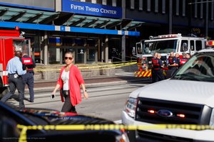 Emergency personnel and police respond to a reported active shooter disruption near Fountain Square, Thursday, Sept. 6, 2018, in Downtown Cincinnati.