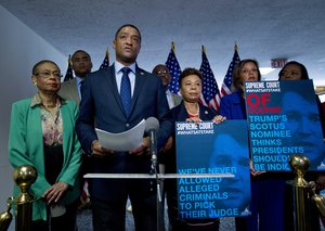 Chair of the Congressional Black Caucus Rep. Cedric Richmond, D-New Orleans, accompanied by other congress members speaks to the media, urging the Senate to reject the Supreme Court nominee Brett Kavanaughon, during his confirmation hearing on Capitol Hill, Thursday, Sept. 6, 2018, in Washington.