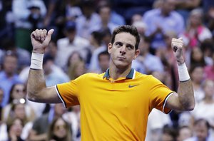 Juan Martin del Potro, of Argentina, reacts after Rafael Nadal, of Spain