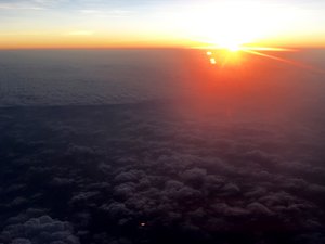 The sun setting over a sea of clouds. Taken on October 2017.