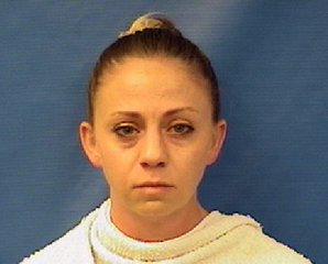 This handout photo provided by the Kaufman County Sheriff's Office shows Amber Renee Guyger. Guyger, a Dallas police officer was arrested Sunday on a manslaughter warrant in the shooting of a black man at his home, Texas authorities said.