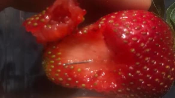 Strawberry needle finds spark warning to cut all berries in half