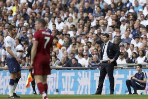 Tottenham coach Mauricio Pochettino looks during the English Premier League soccer match between Tottenham Hotspur and Liverpool at Wembley Stadium in London, Saturday Sept. 15, 2018.