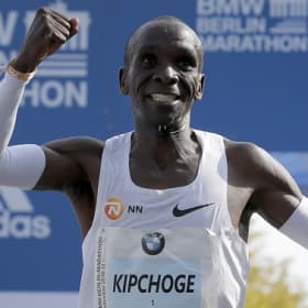 Olympic champion breaks marathon world record