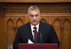 Hungarian Prime Minister Viktor Orban, front, delivers his address during the opening of the autumn session of the Hungarian Parliament in Budapest, Hungary, Monday, Sept. 17, 2018.