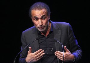 In this Feb.7 2016 file photo, Muslim scholar Tariq Ramadan delivers a speech during a French Muslim organizations meeting in Lille, northern France.