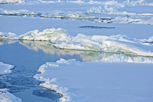 File - Ice floes in the Arctic Ocean, north of western Russia.