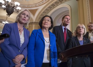 From left, Sen. Kirsten Gillibrand, D-N.Y., Sen. Mazie Hirono, D-Hawaii, Sen. Richard Blumenthal, D-Conn., and Sen. Patty Murray, D-Wash., assistant Senate minority leader, speak with reporters about Supreme Court nominee Brett Kavanaugh following their weekly policy meetings, at the Capitol in Washington, Tuesday, Sept. 18, 2018.