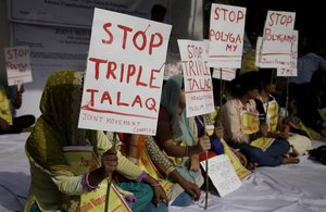 Activists of various social organisations hold placards during a protest against "Triple Talaq", a divorce practice prevalent among Muslims in New Delhi, India, Wednesday, May 10, 2017.