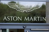 The Aston Martin logo is displayed above the main entrance at the Aston Martin Lagonda assembly plant in Gaydon, UK. 