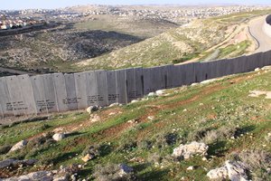 File - Israeli West-Bank barrier near Ramallah with texts sprayed on the wall as requested by people of the organisation "sendamessage".