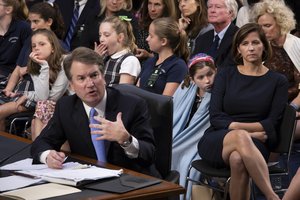 Supreme Court nominee Brett Kavanaugh testifies before the Senate Judiciary Committee on the third day of his confirmation hearing as he is joined by, from right to left, his wife Ashley Estes Kavanaugh, and their daughters Liza and Margaret, on Capitol Hill in Washington, Thursday, Sept. 6, 2018.