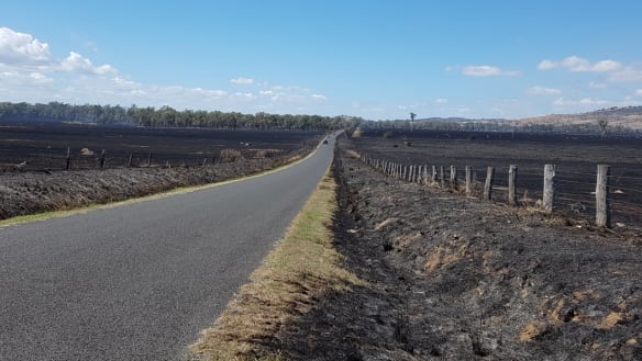 Queensland bushfires continue to burn