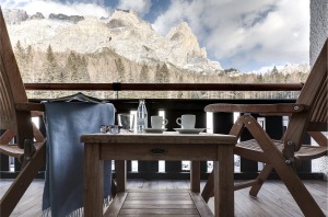 Along with spectacular views of the Dolomites, Ciasa Salares in the South Tyrol offers sophistication and alpine cosiness.