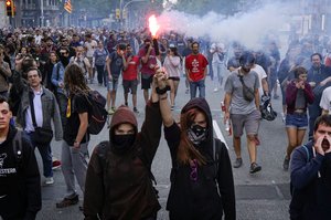 Pro independence demonstrators, march during a protest in Barcelona, Spain, on Monday, Oct. 1, 2018.