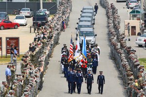 File - United Nations Command returned 55 cases of remains from the Democratic People's Republic of Korea, also known as North Korea, to Osan Air Base, South Korea, July 27, 2018.