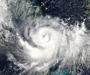 File - Satellite image of Hurricane Michael on October 8, 2018.  the Hurricane is expected to intensify as it bears down on Florida.