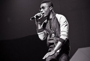 Wizkid at Iyanya's album launch concert, 2013